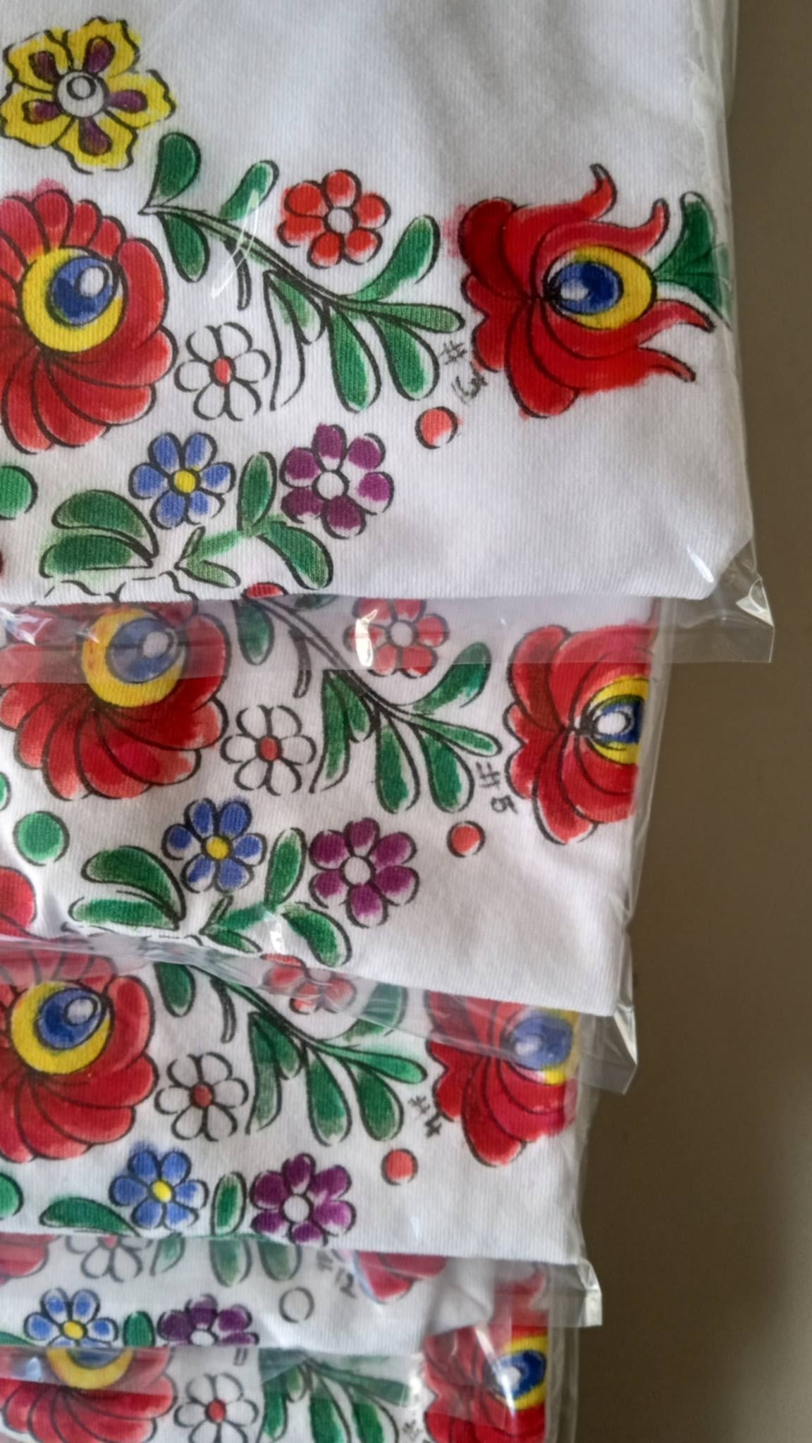 Close-up of individually hand-painted Matyó shirts