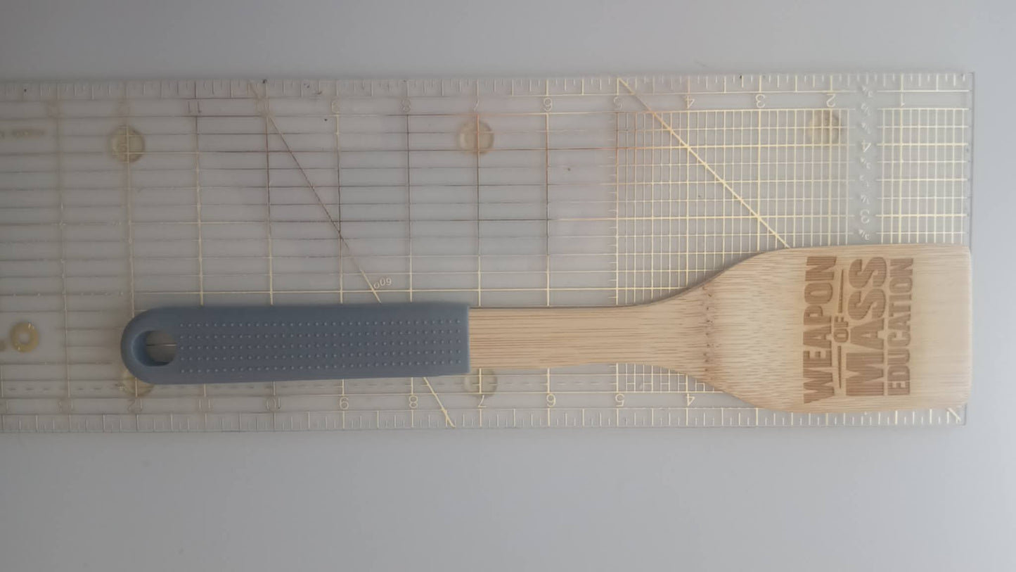 Approximately 12-inch Fakanal bamboo spatula shown with ruler
