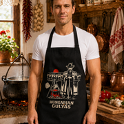 Fit clean-shaven Hungarian man wearing the Hungarian Gulyás apron in a rustic Hungarian kitchen