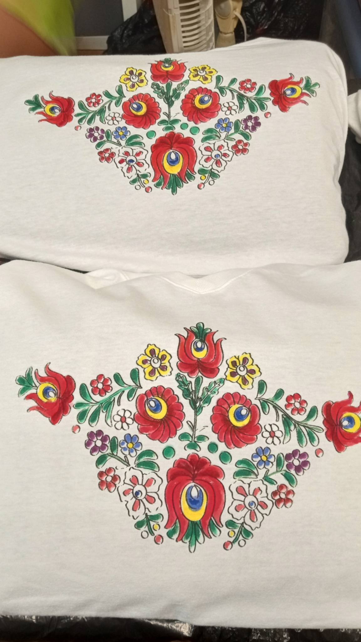 Two original hand-painted Matyó floral shirt designs