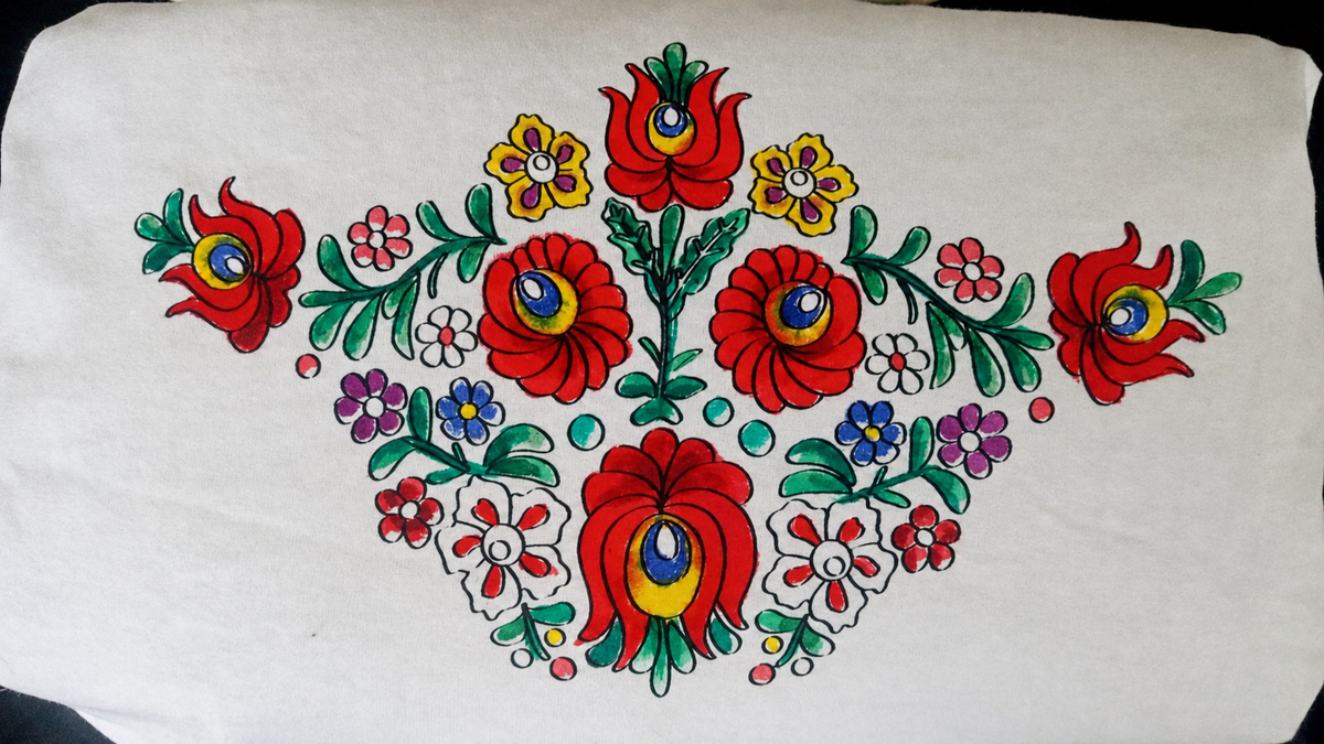 Close-up of original hand-painted wide Matyó floral artwork