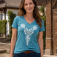 Woman wearing turquoise Kalotaszeg Tee with white Hungarian folk motif
